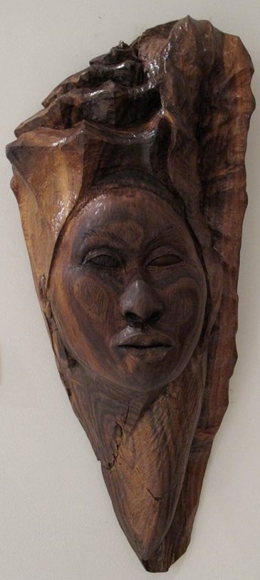Afreekan Southwell - Antigua-USVI - Tung Yoni-mahogany wood